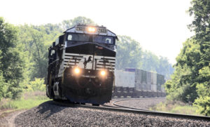 A Norfolk Southern train heads west through Otis, Ind