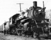 Ann Arbor 4-4-2 steam locomotive with passenger train.