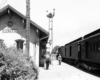 Ann Arbor 4-6-2 steam locomotive with passenger train at station.
