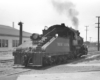 An 0-6-0 steam locomotive switch engine with slope back tender.