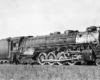Side view of a 4-8-4 steam locomotive.