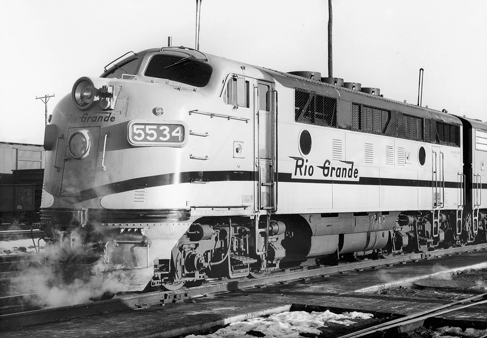 Oblique front view of a cab style diesel locomotive.