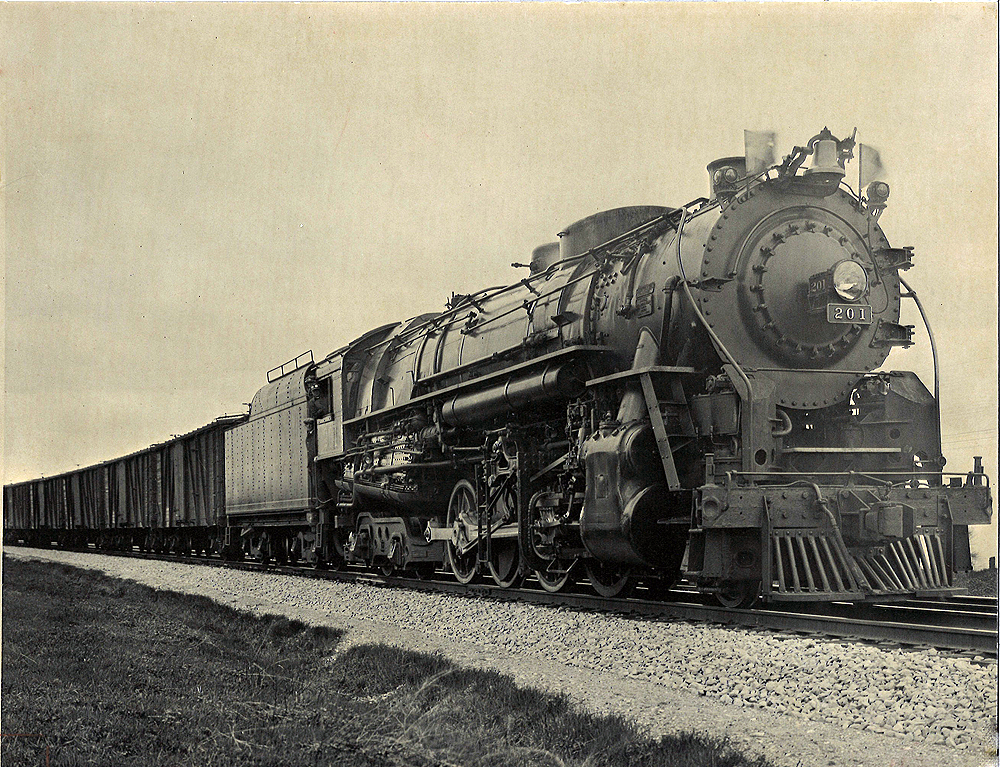 Toronto, Hamilton & Buffalo steam locomotive with freight train.