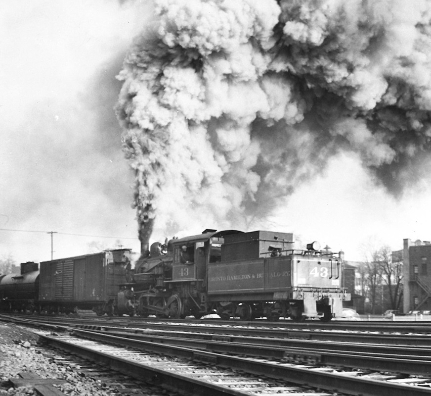 Toronto, Hamilton & Buffalo steam locomotive with freight train.