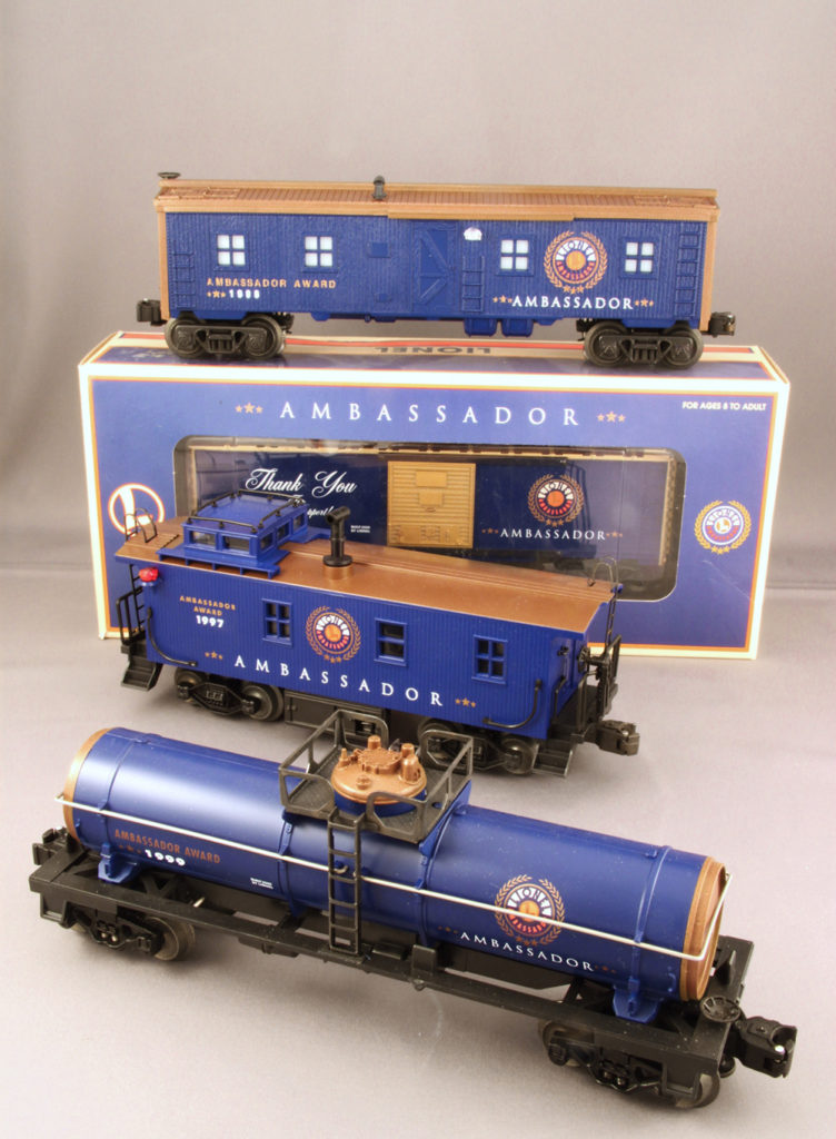 Scarce Lionel Ambassador bunk car, boxcar, caboose, and tank car: How to put a price on toy trains