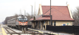 Passenger train by station