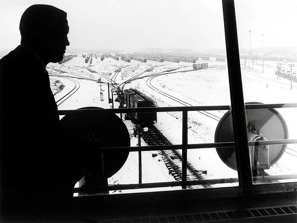 Man overlooking hump yard from tower