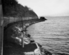 Alco road-switchers with New York–Montreal Laurentian along Lake Champlain, fall 1953.