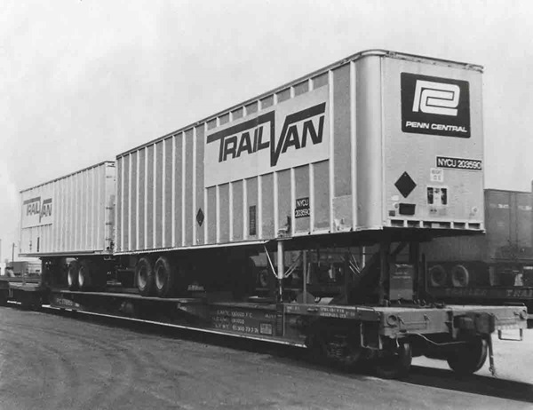 Modified for trailer-on-flatcar service as a test by Penn Central, a former Flexi-Van car carried trailers back-to-back.