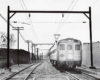 Budd Silverliner 9007 arrives at Fox Chase station on a run from Reading Terminal in 1966.