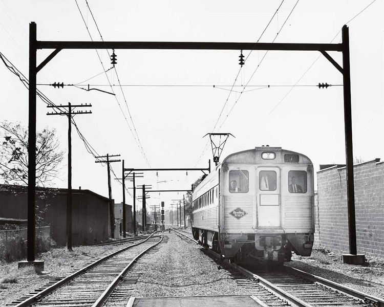 Budd Silverliner 9007 arrives at Fox Chase station on a run from Reading Terminal in 1966.