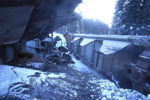 Derailed rail cars in snow