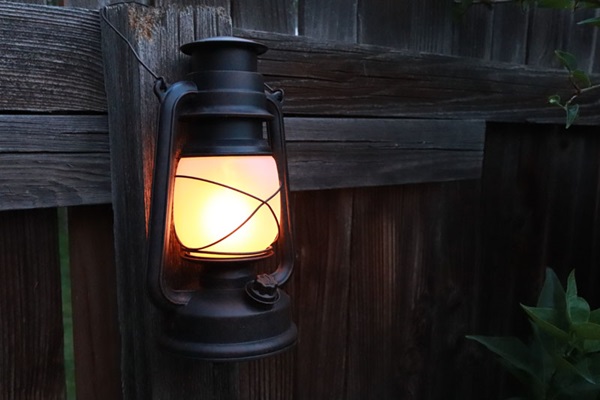 Close up of lit battery-powered lantern