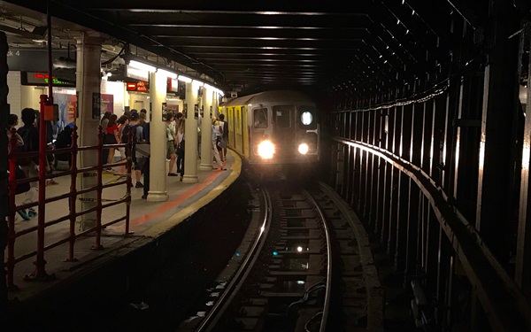 Subway train arriving in station