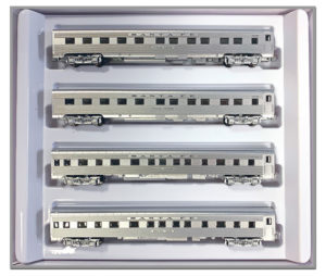 Four passenger cars in packaging