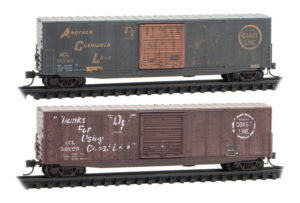 Two weather boxcars