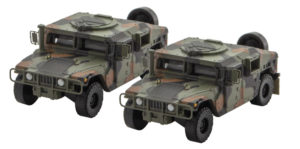 Camouflage colored Humvee trucks