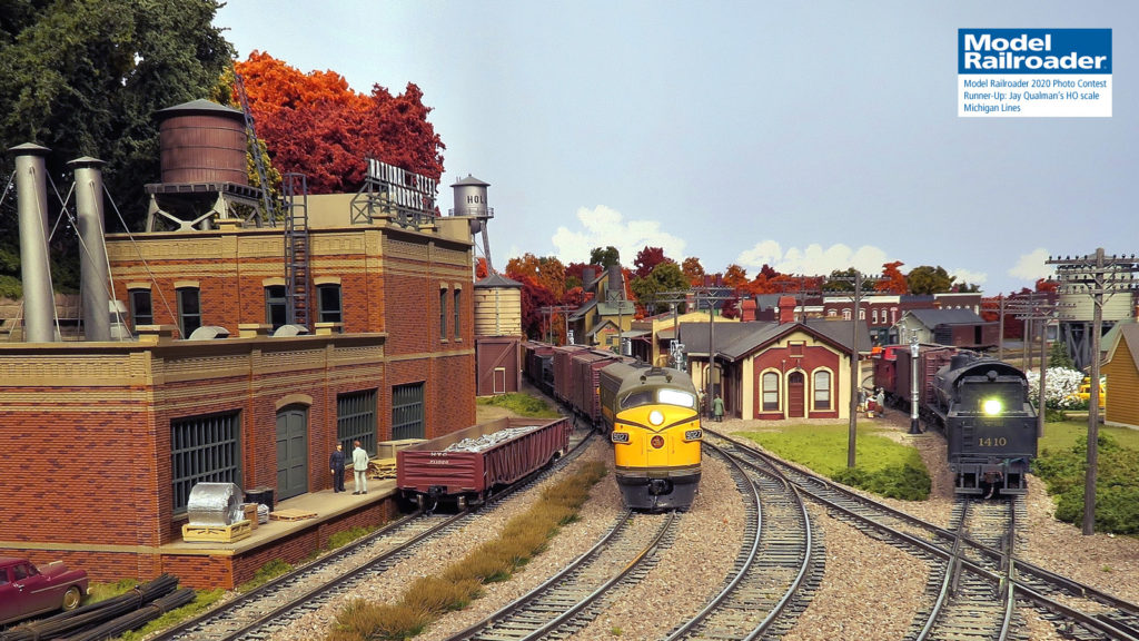 Jay Qualman photographed the action on the HO scale Michigan Lines.