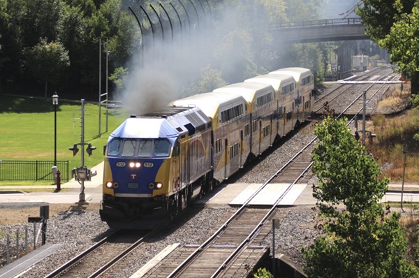 Commuter train with smoking locomotive