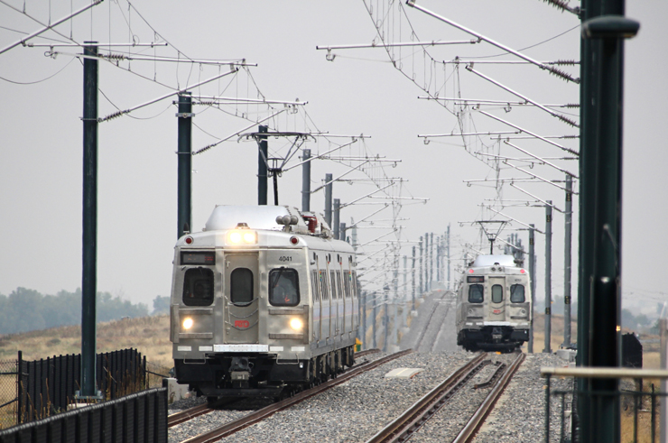 Two electrified commuter trains meet