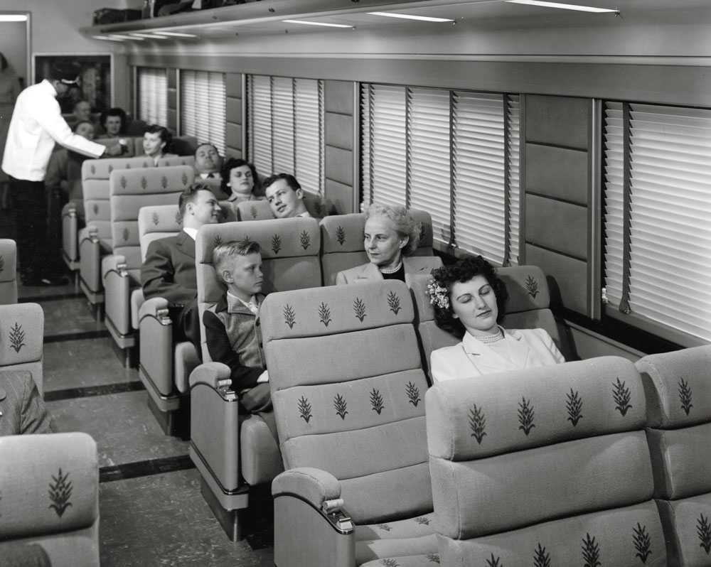 Interior view of coach with passengers seated