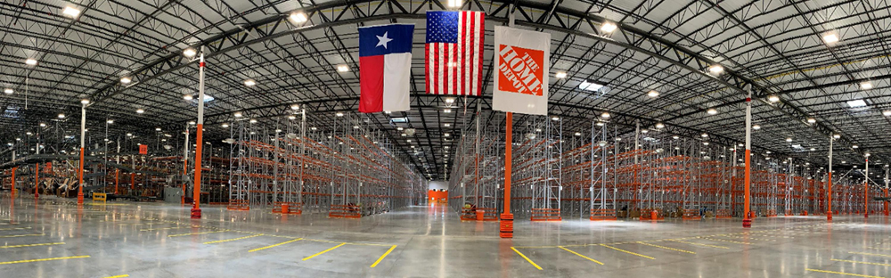View of a Home Depot distribution center. Wide-angle image.