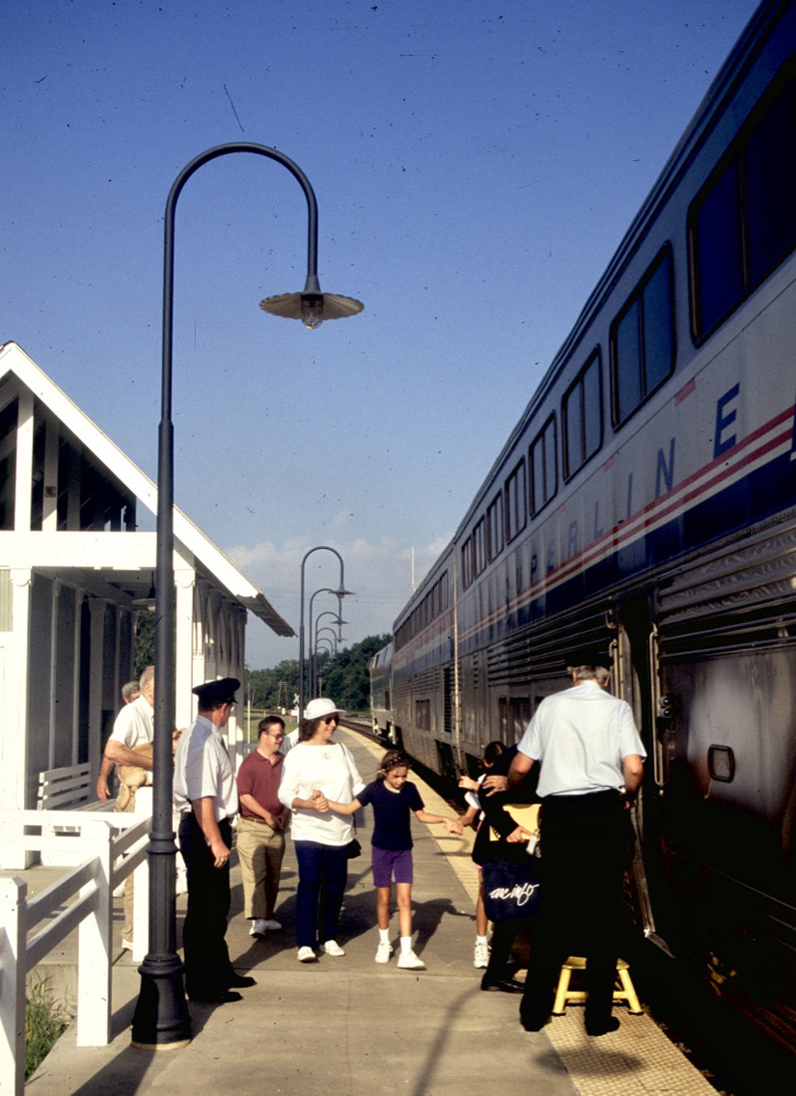 People boarding train