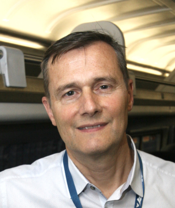 Man standing in passenger car