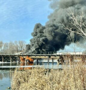 Fire and smoke billowing in the distance