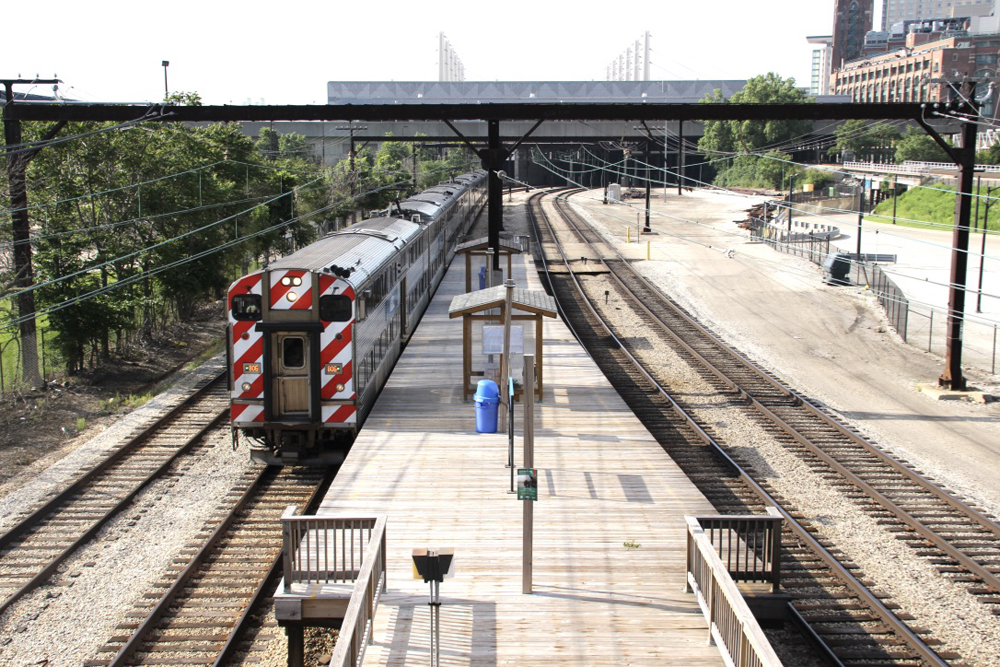 Metra train arrives at station platform in downtown Chicago