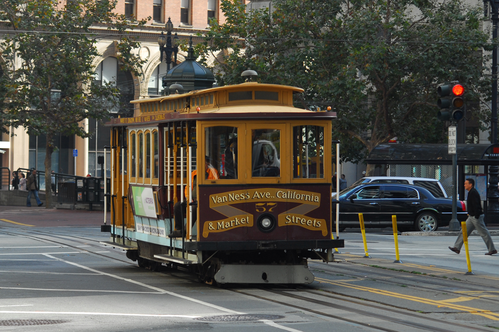 A San Francisco cable car in a street.