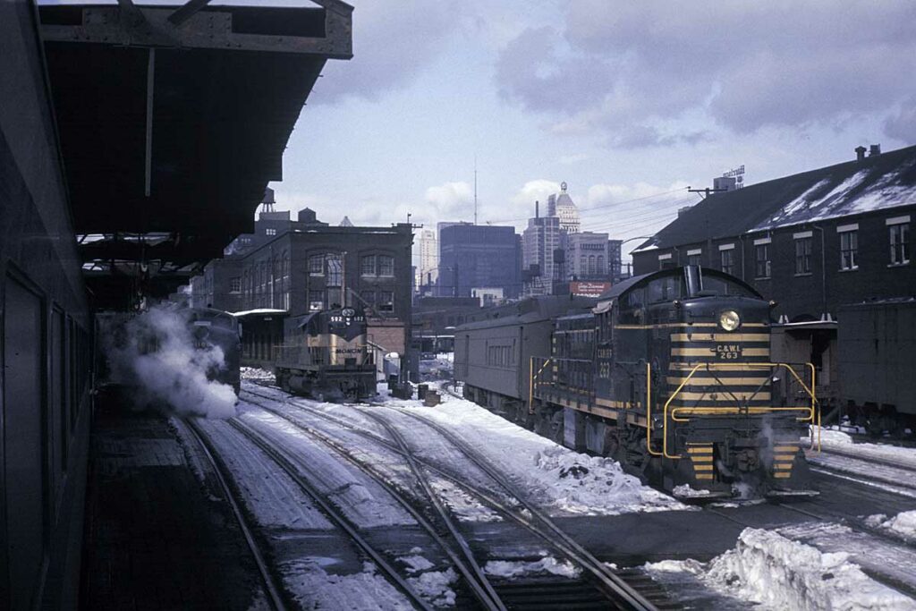 Diesel switcher works snow-covered station tracks