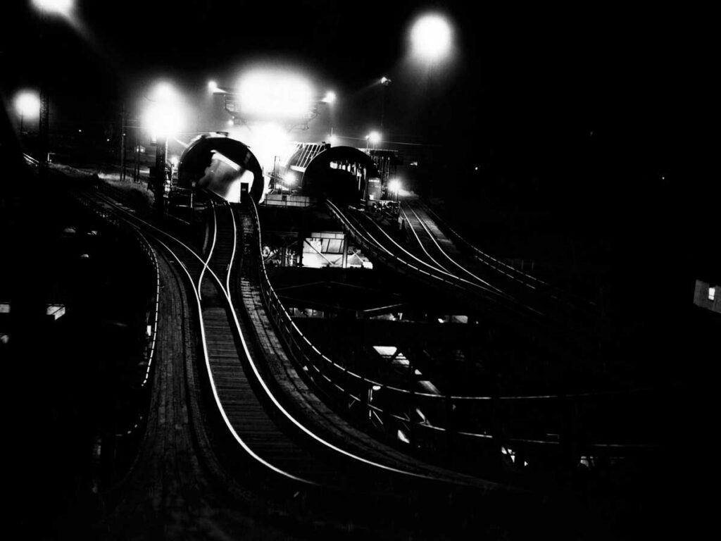 Tracks on coal transfer dock at night