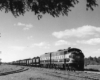 Streamlined diesel locomotives with freight train