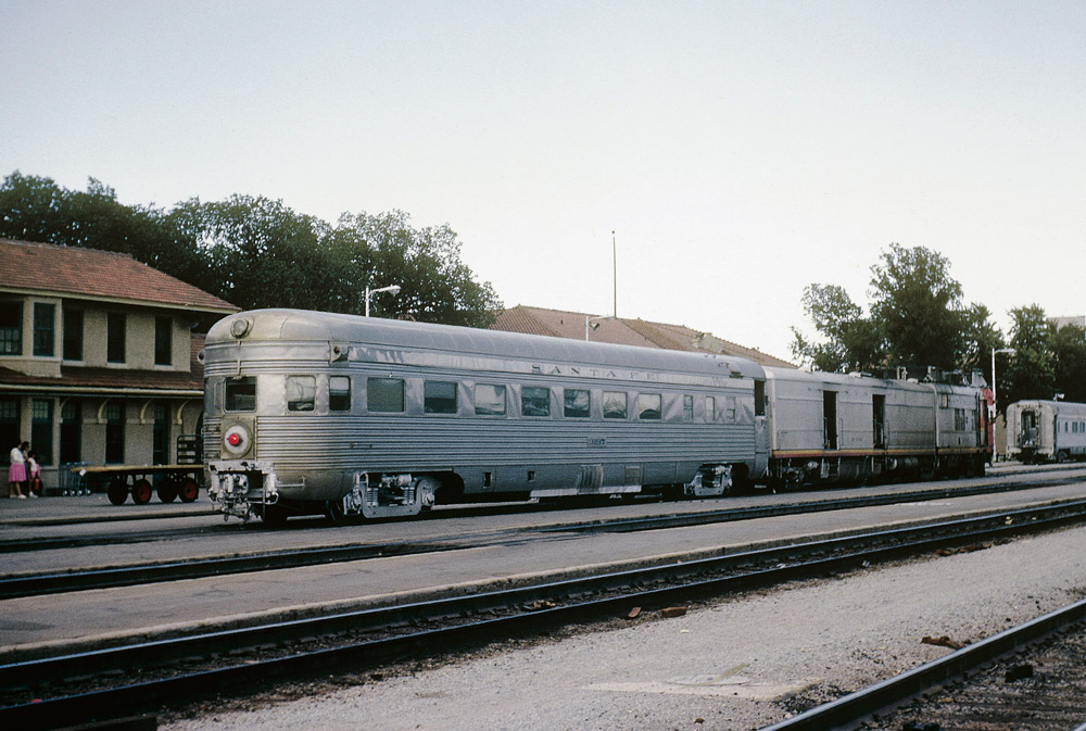 Rear view of motor passenger train at station