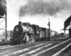 Steam locomotive with freight train