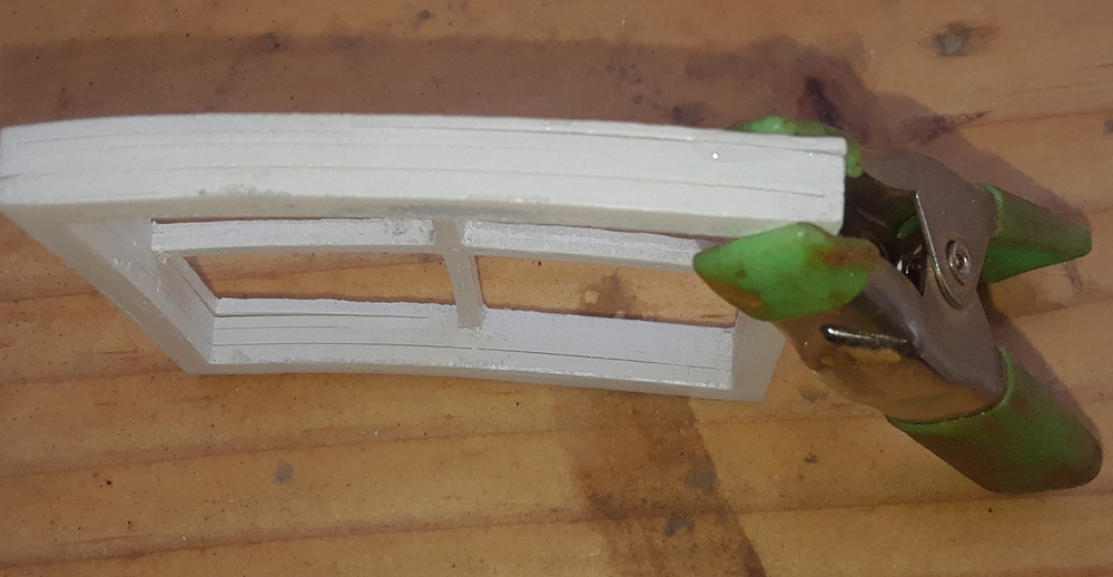 A 3D printed window glued and clamped