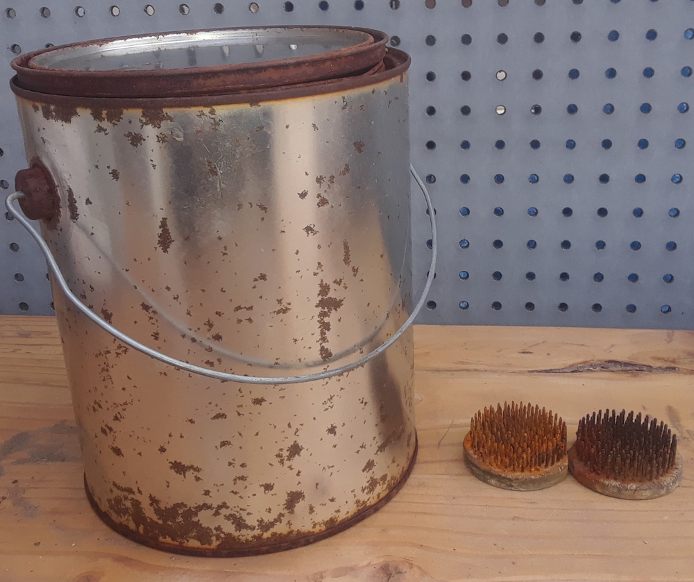 Metal paint can with metal flower frogs