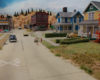 Concrete street with two, two-story wood-frame houses made from Walthers Cornerstone kits, Railway Express Agency warehouse in background