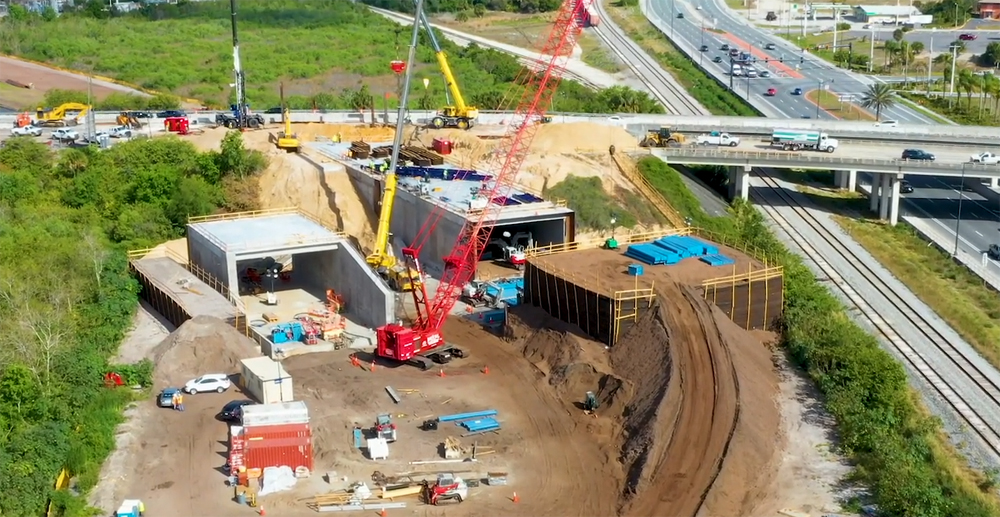 Construction site where highway meets rail line