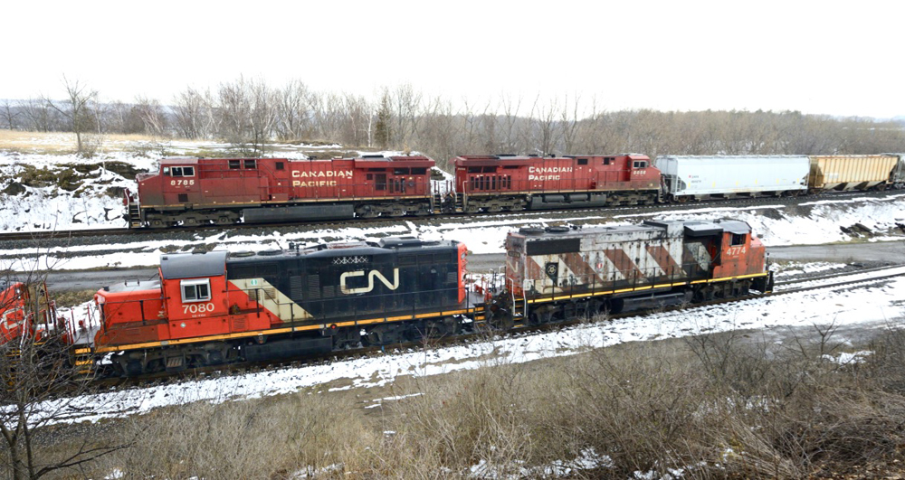 Canadian Pacific and Canadian National trains pass