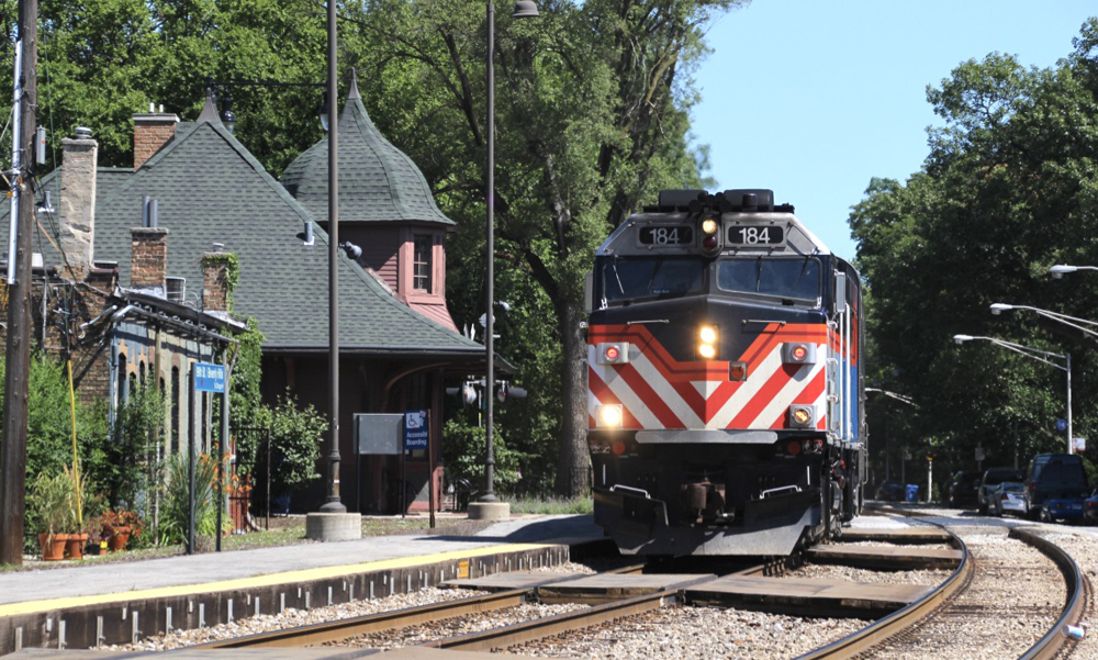 Locomotive rounds curve at station