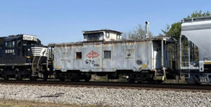 Caboose in middle of freight train