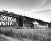 Road-switcher diesel locomotives with hopper cars on ore dock 