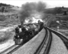 Steam locomotive with freight train.