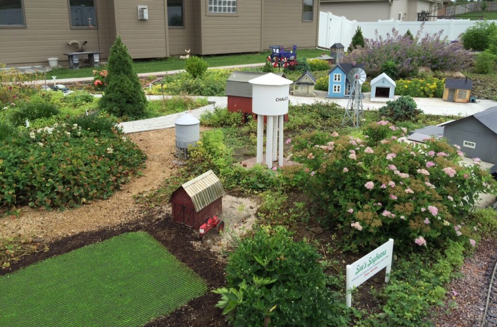 The model soybean field in place next to a farm.