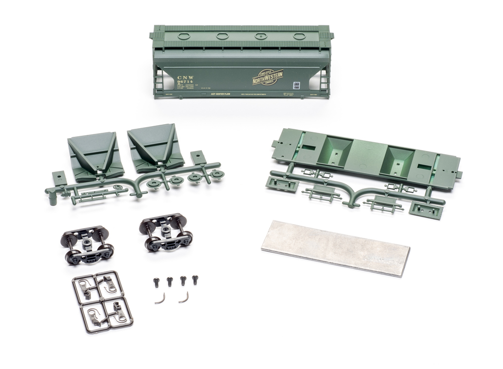 Accurail HO scale American Car & Foundry 2,970-cubic-foot-capacity two-bay Center Flow covered hopper kit contents.