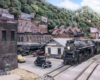 A weathered steam engine leads a train past a white clapboard station in an Appalachian town