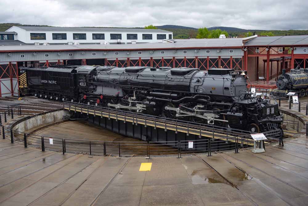 Steam locomotive and tender on turntable