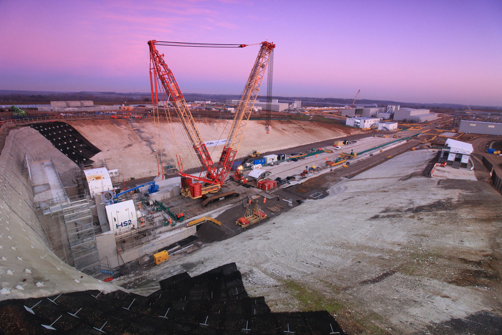 Heavy equipment working at tunnel entrance